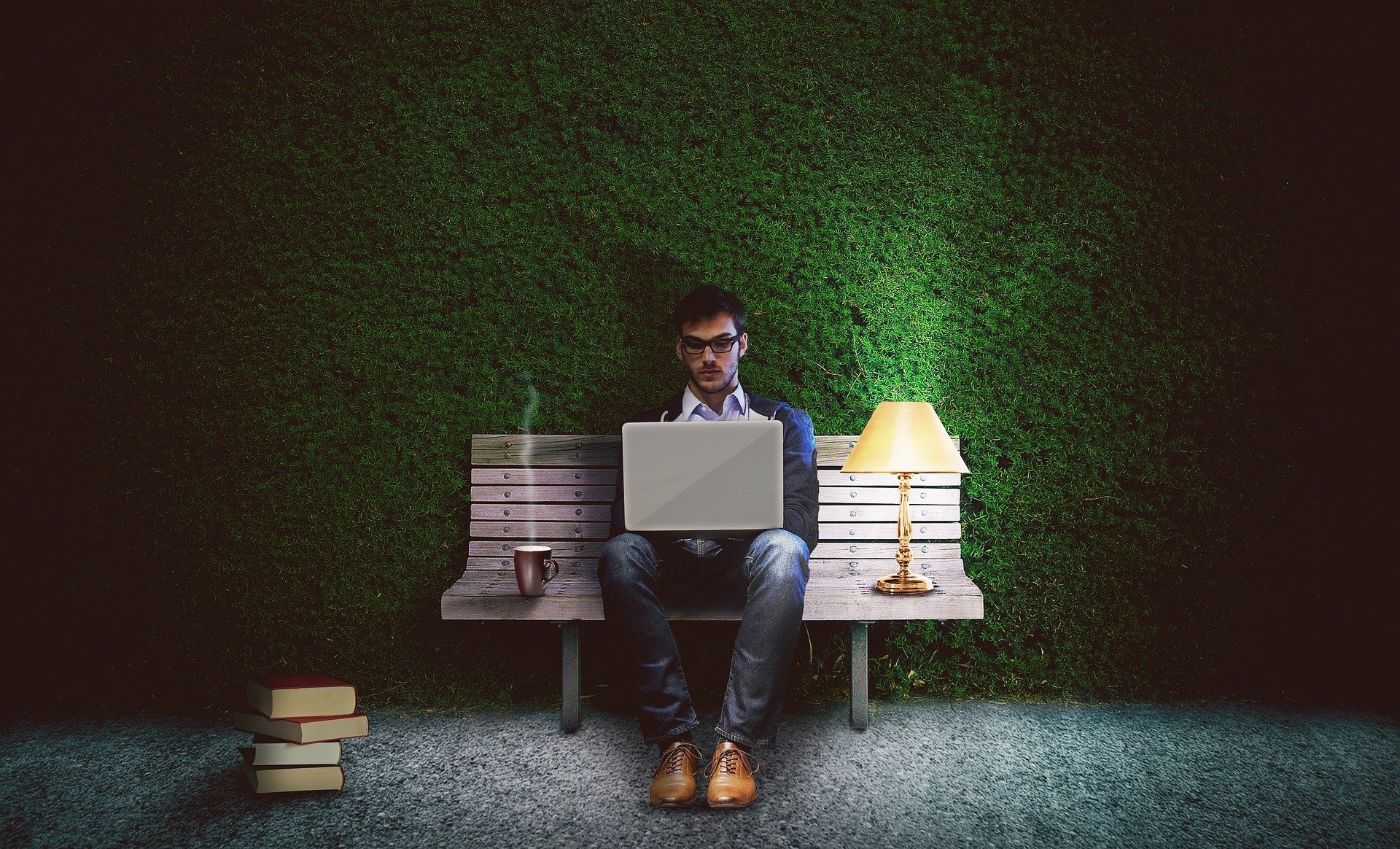 Man with laptop on lap