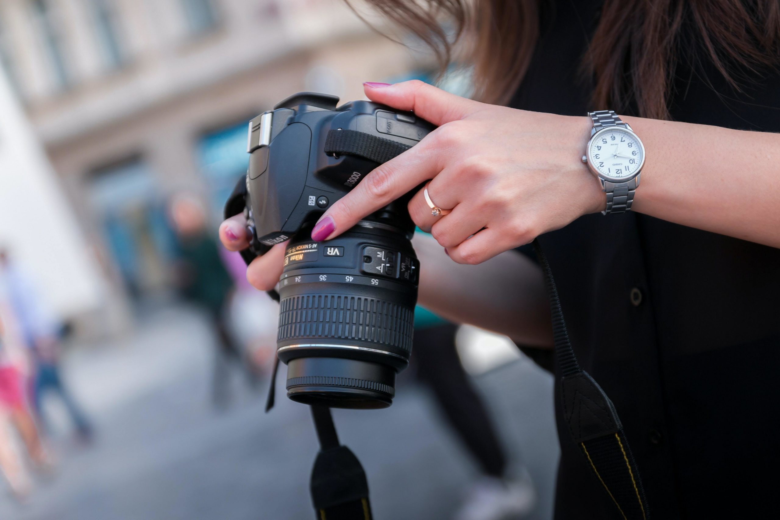 Hands holding camera