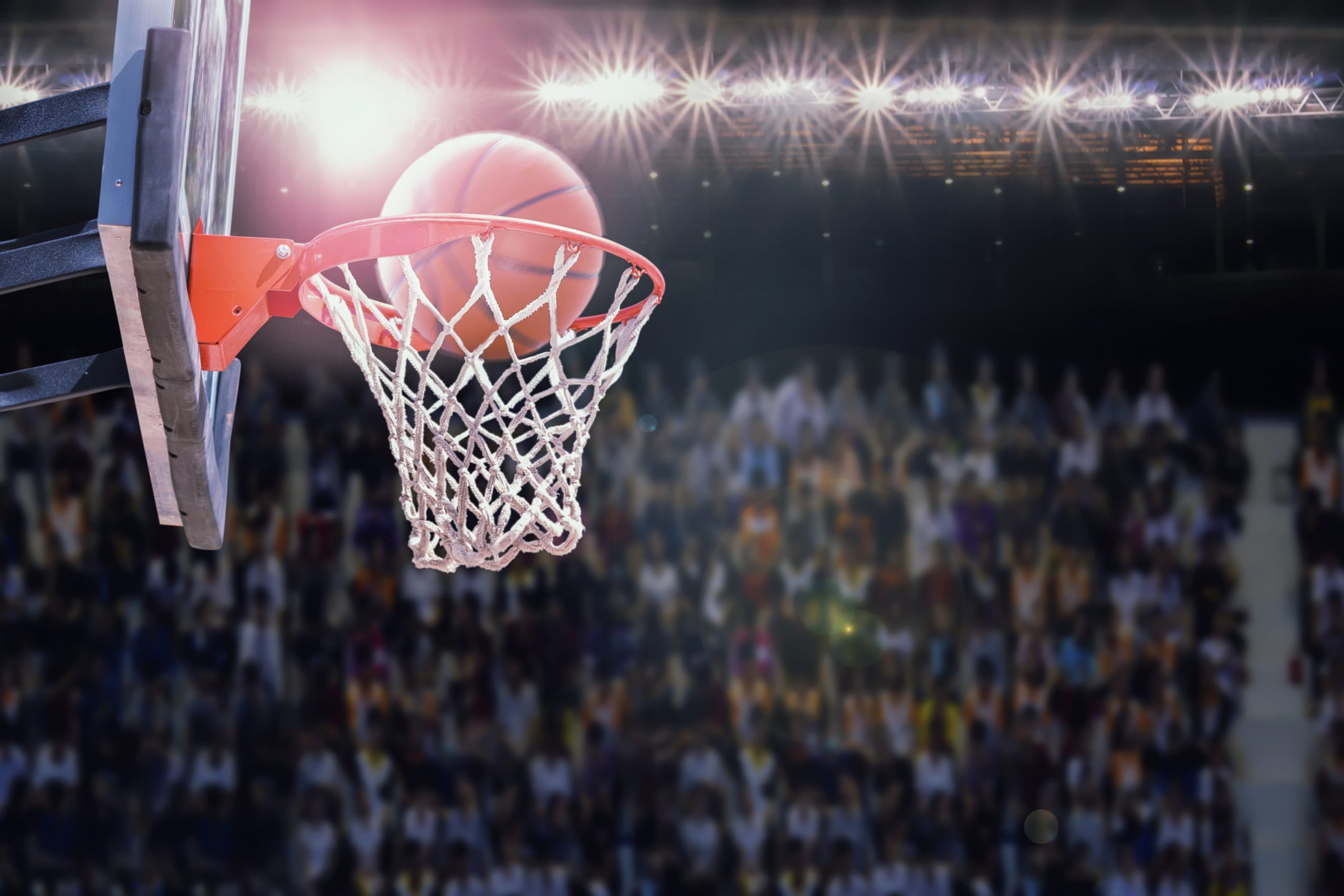 Low Angle View Of Basketball In Hoop 