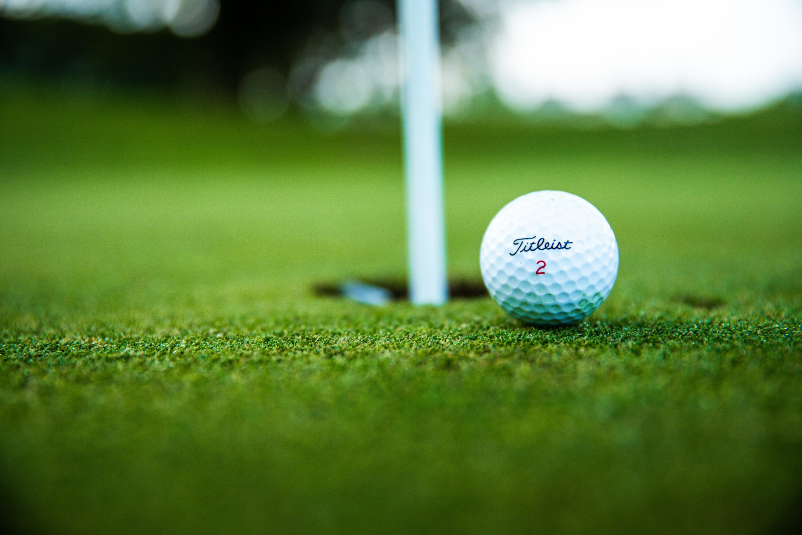 Golf ball and hole