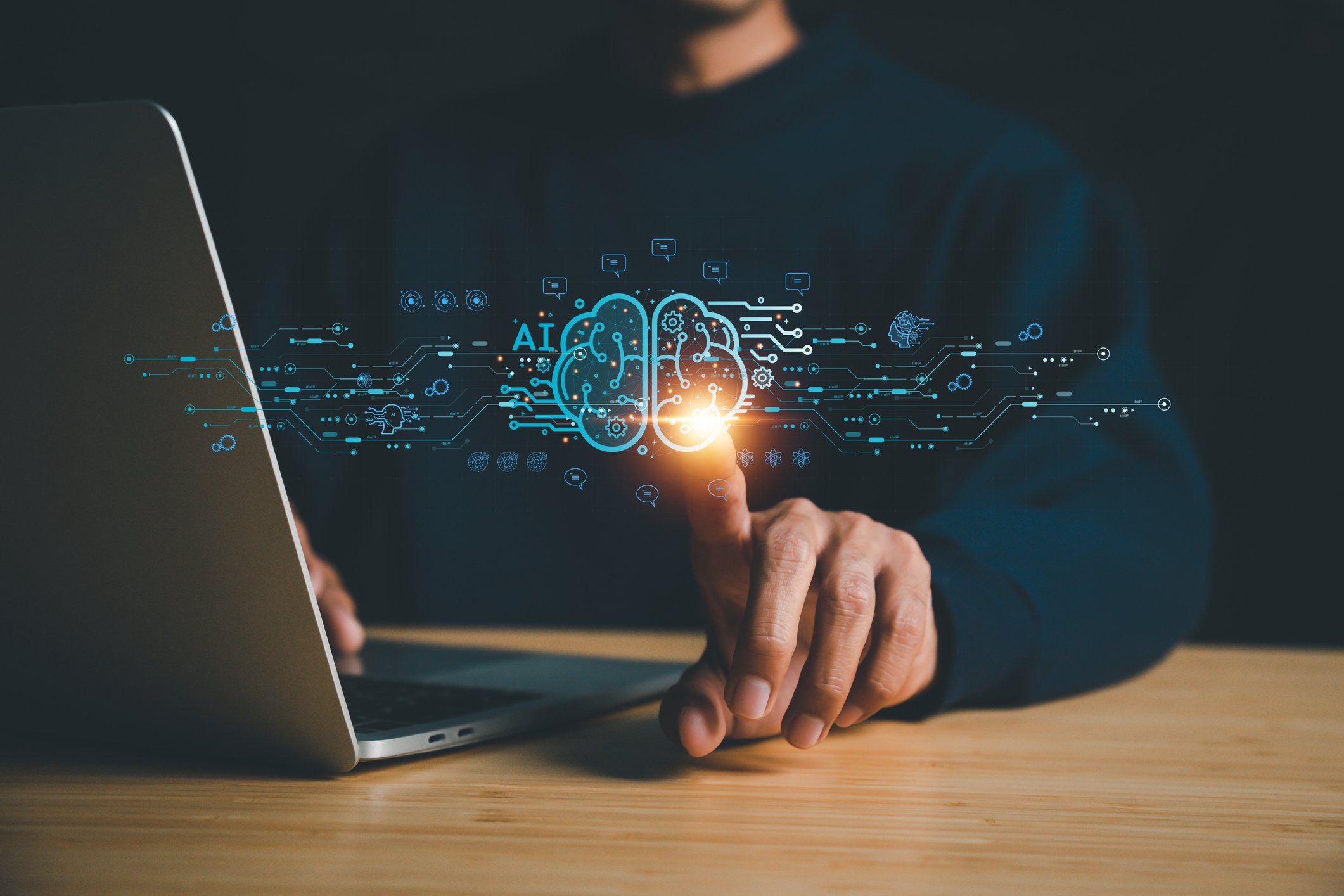 Man touching a projection of computational data