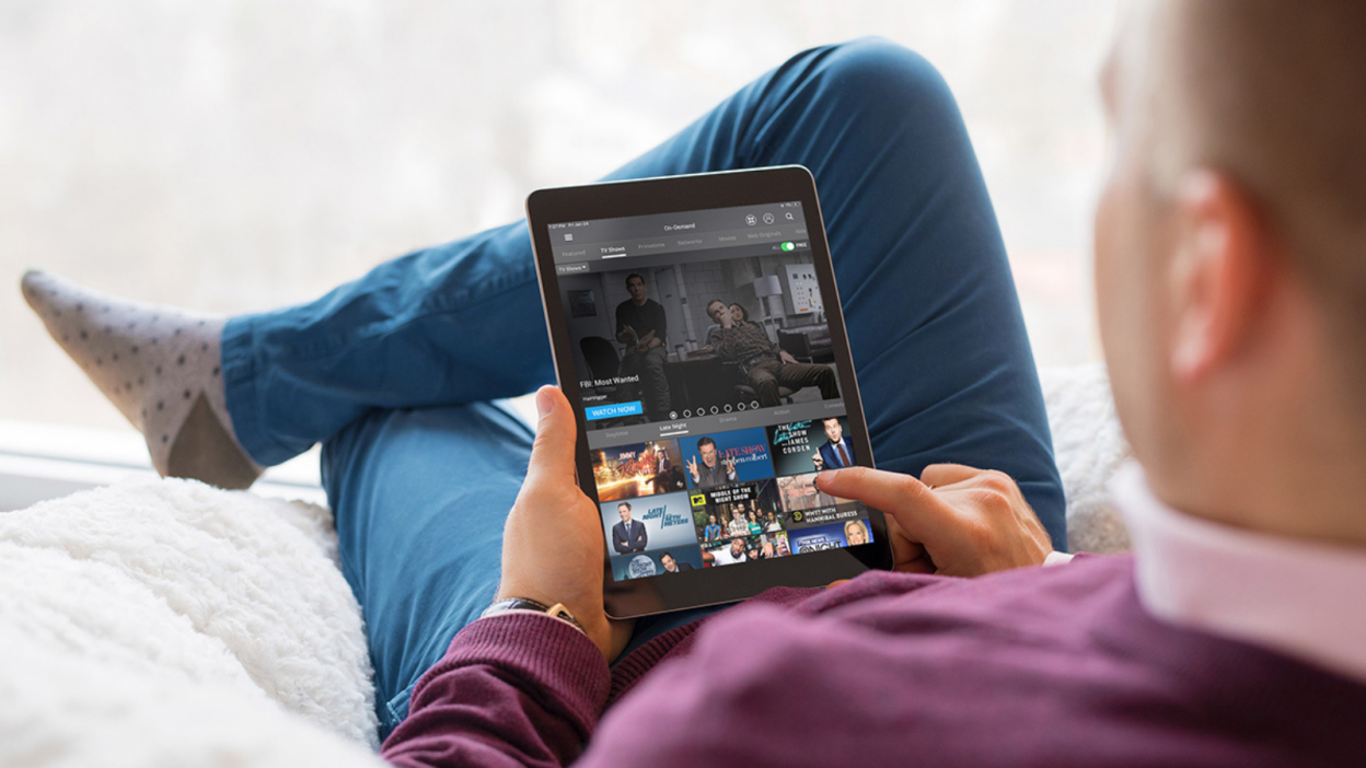 Man looking at tablet