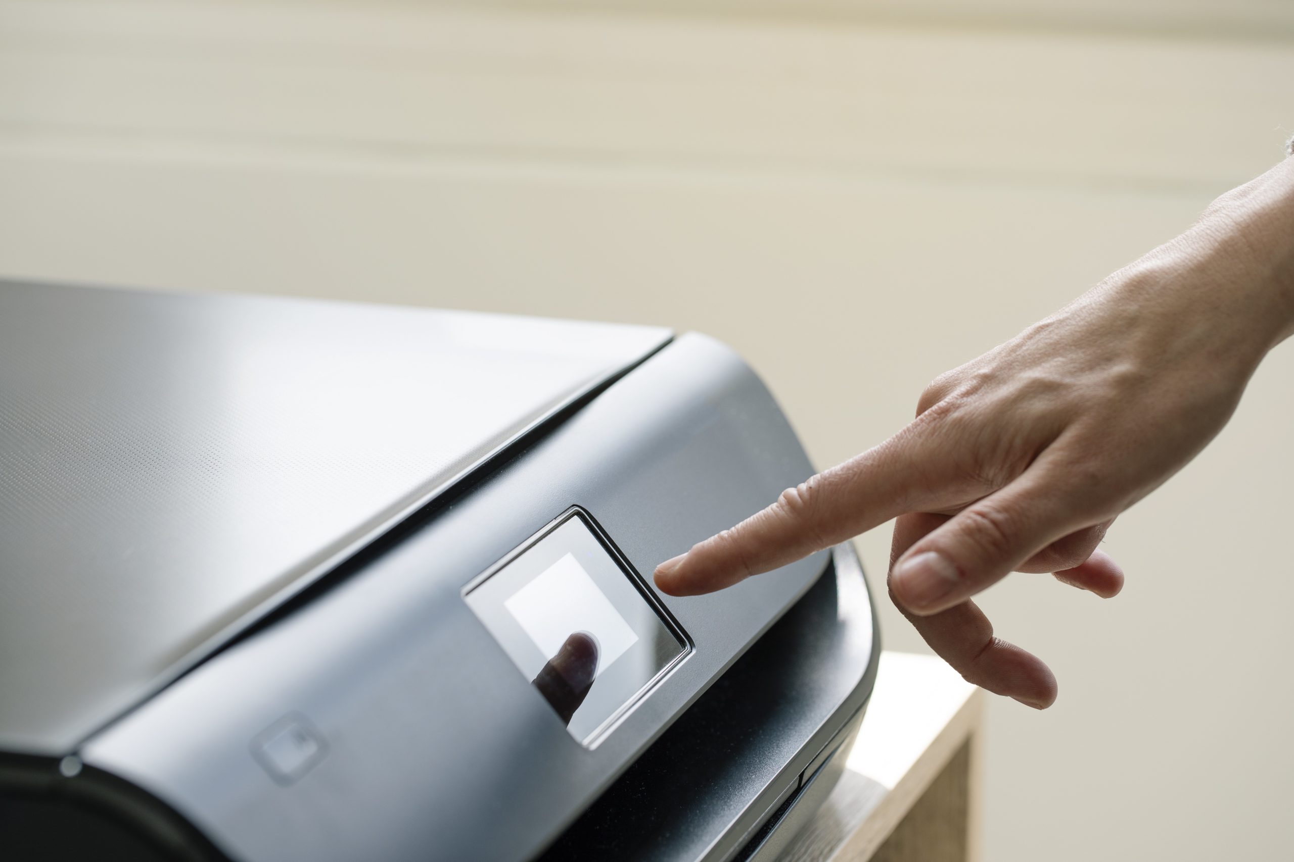 Hand using computer printer