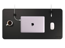 macbook on desk mat pro with mouse and coffee