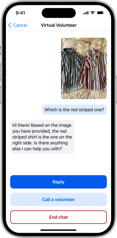 A screenshot of the Virtual Volunteer's response to a question about striped shirts. The response reads, &ldquo;Hi, there! Based on the image you have provided, the red striped shirt is the one of the right side. Is there anything else I can help you with?&rdquo; Below the response are three buttons that read, &ldquo;Reply&rdquo;, &ldquo;Call a Volunteer&rdquo;, and &ldquo;End Chat&rdquo;. 