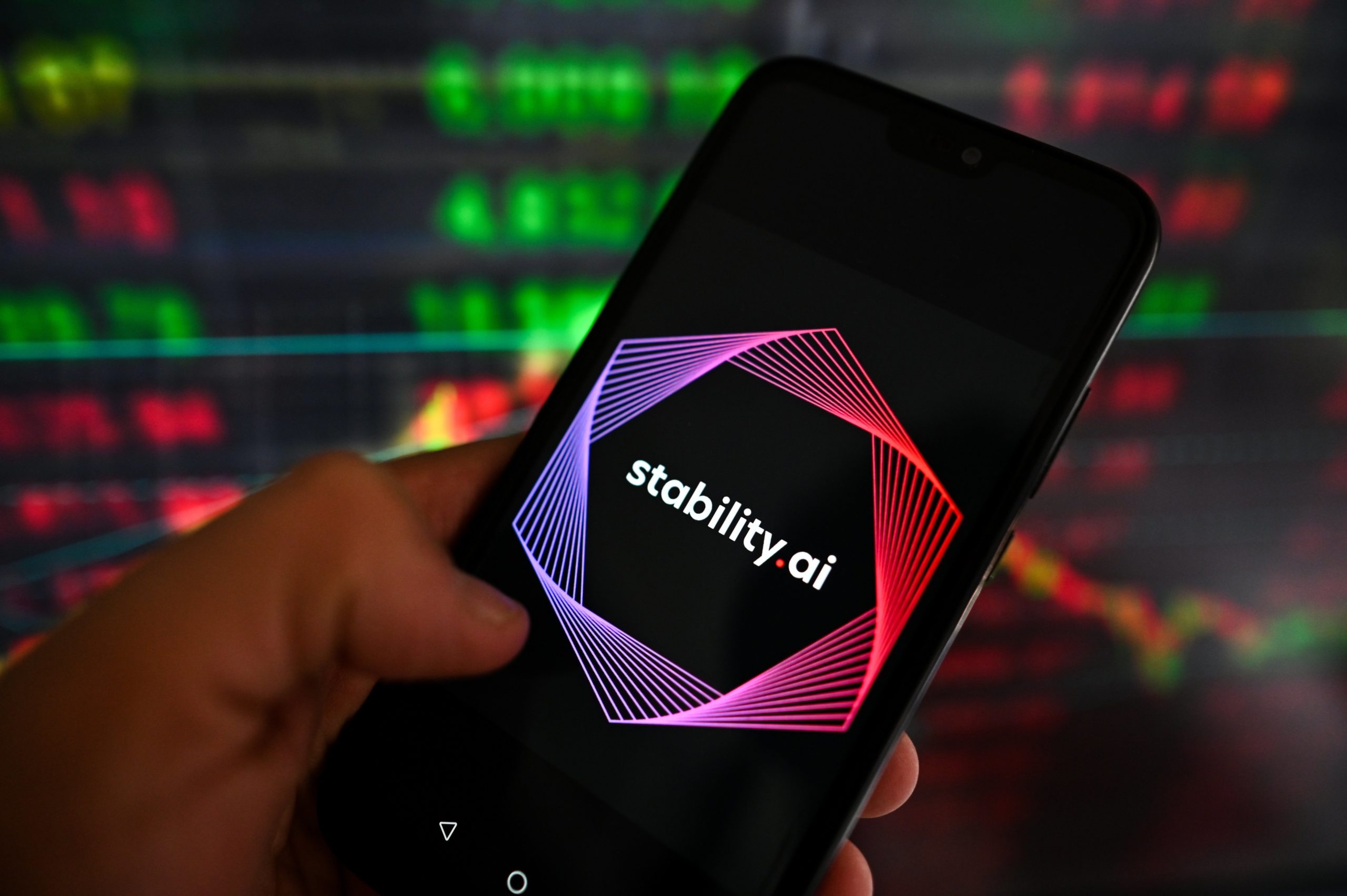 A phone with the Stability AI logo displayed
