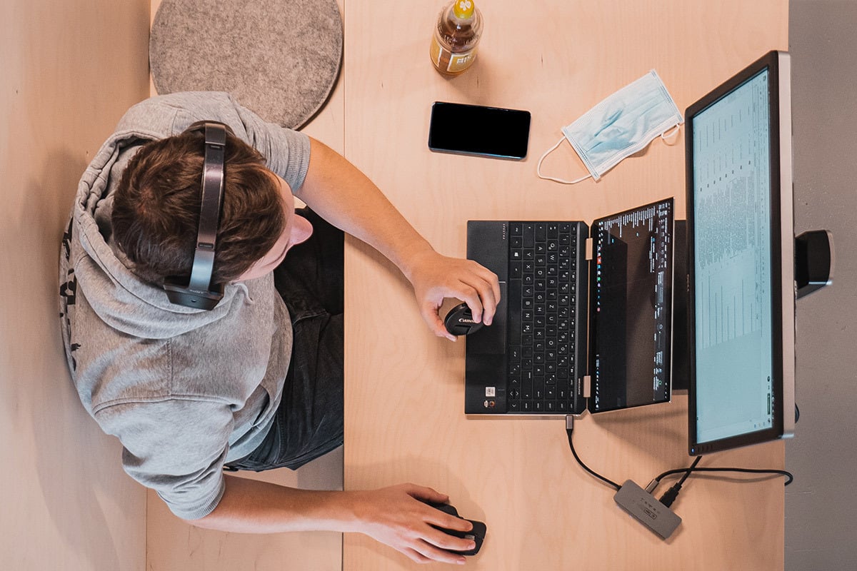 Man using a computer at a desk