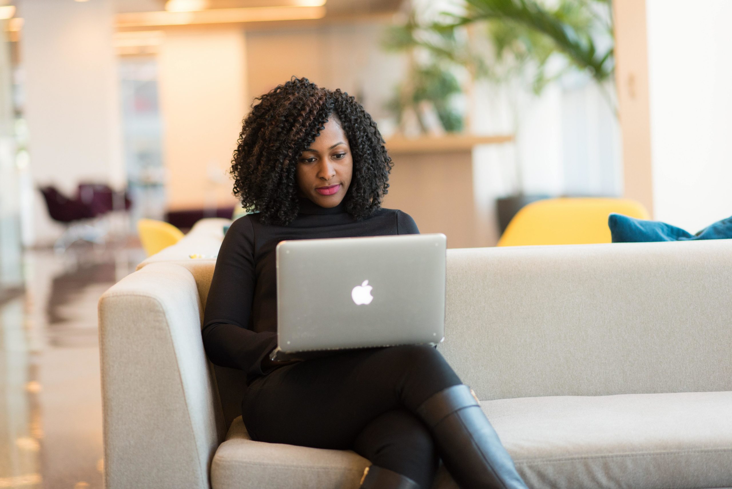 Woman looking at laptop