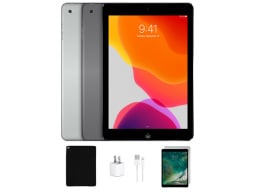 silver ipad against a plain white background