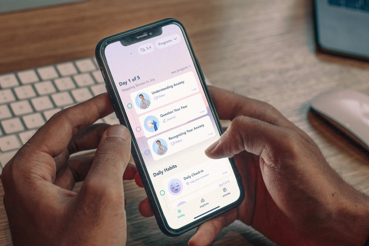 Person using the Bloom app on a smartphone