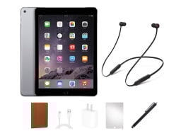 ipad with beats earbuds and other accessories