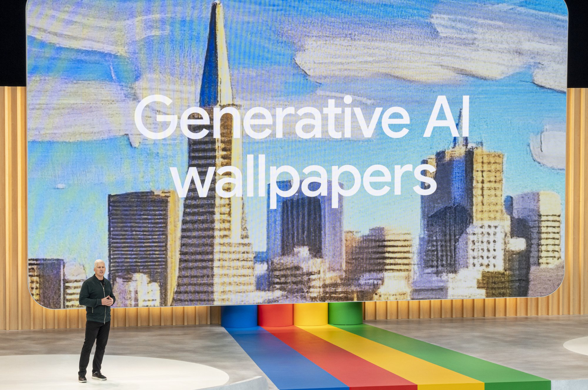 A Google executive in front of a slide reading "Generative AI wallpapers"