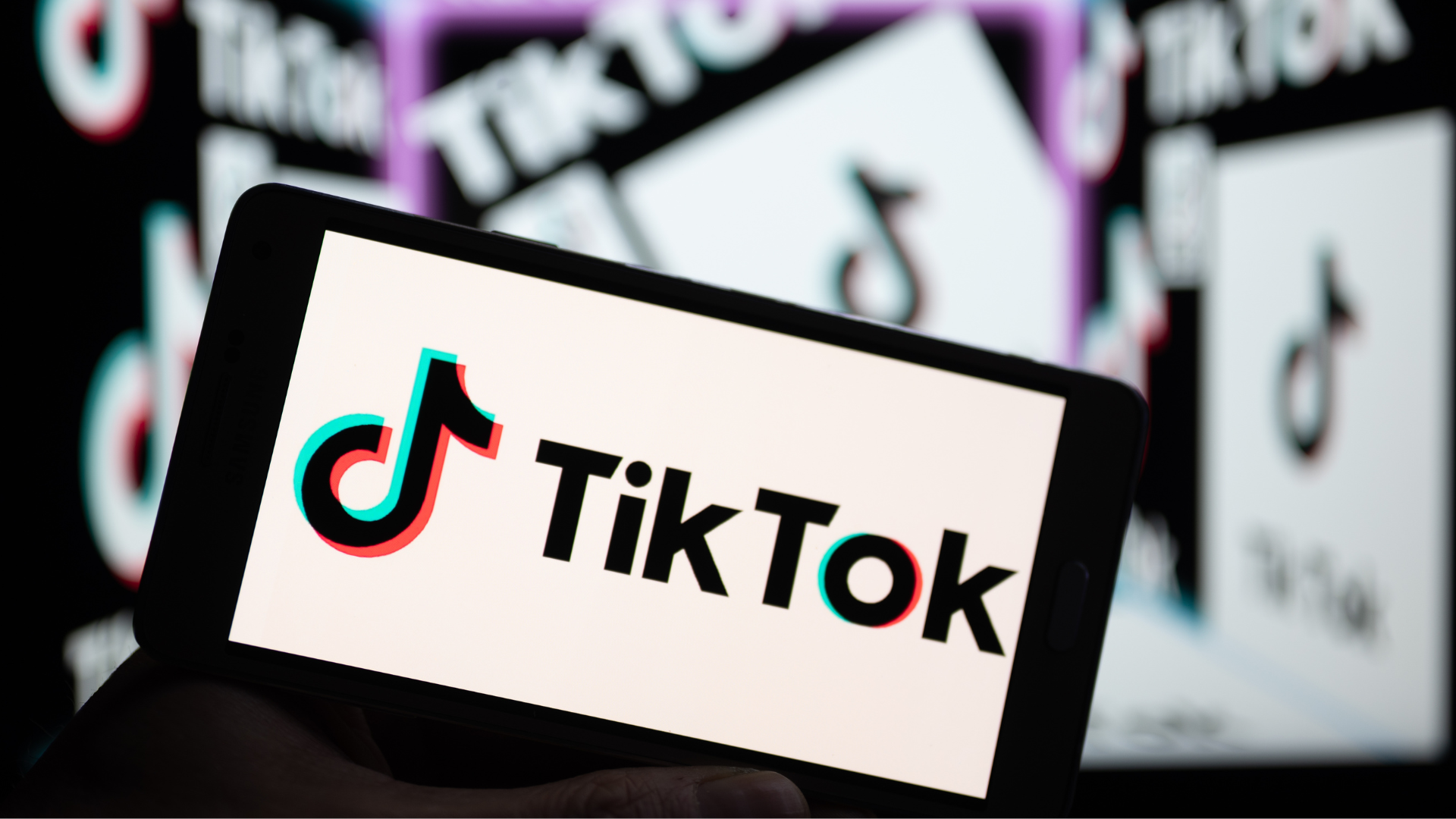 A phone screen with the TikTok logo on a white background.