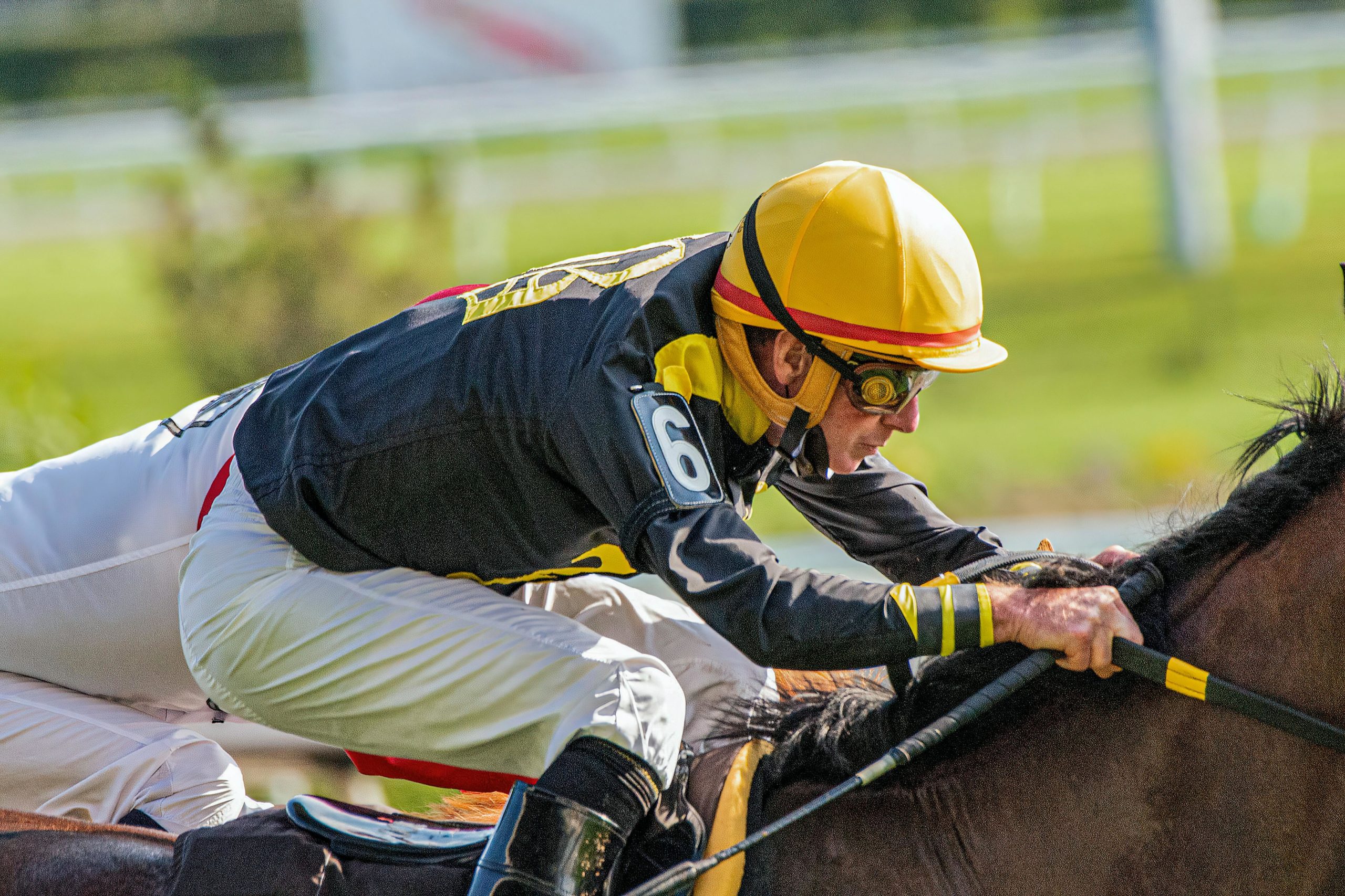 Jockey riding horse