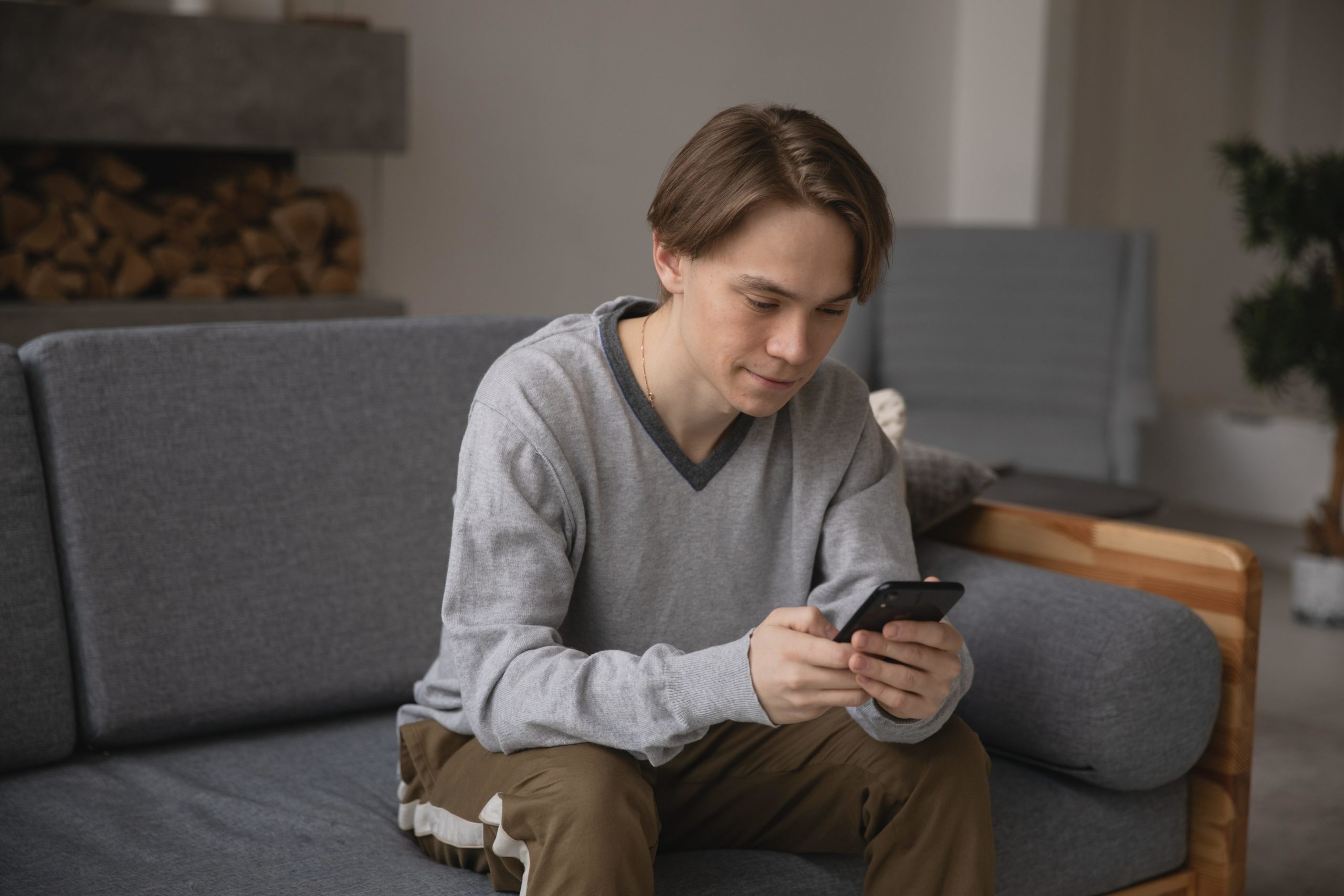 Boy using mobile phone