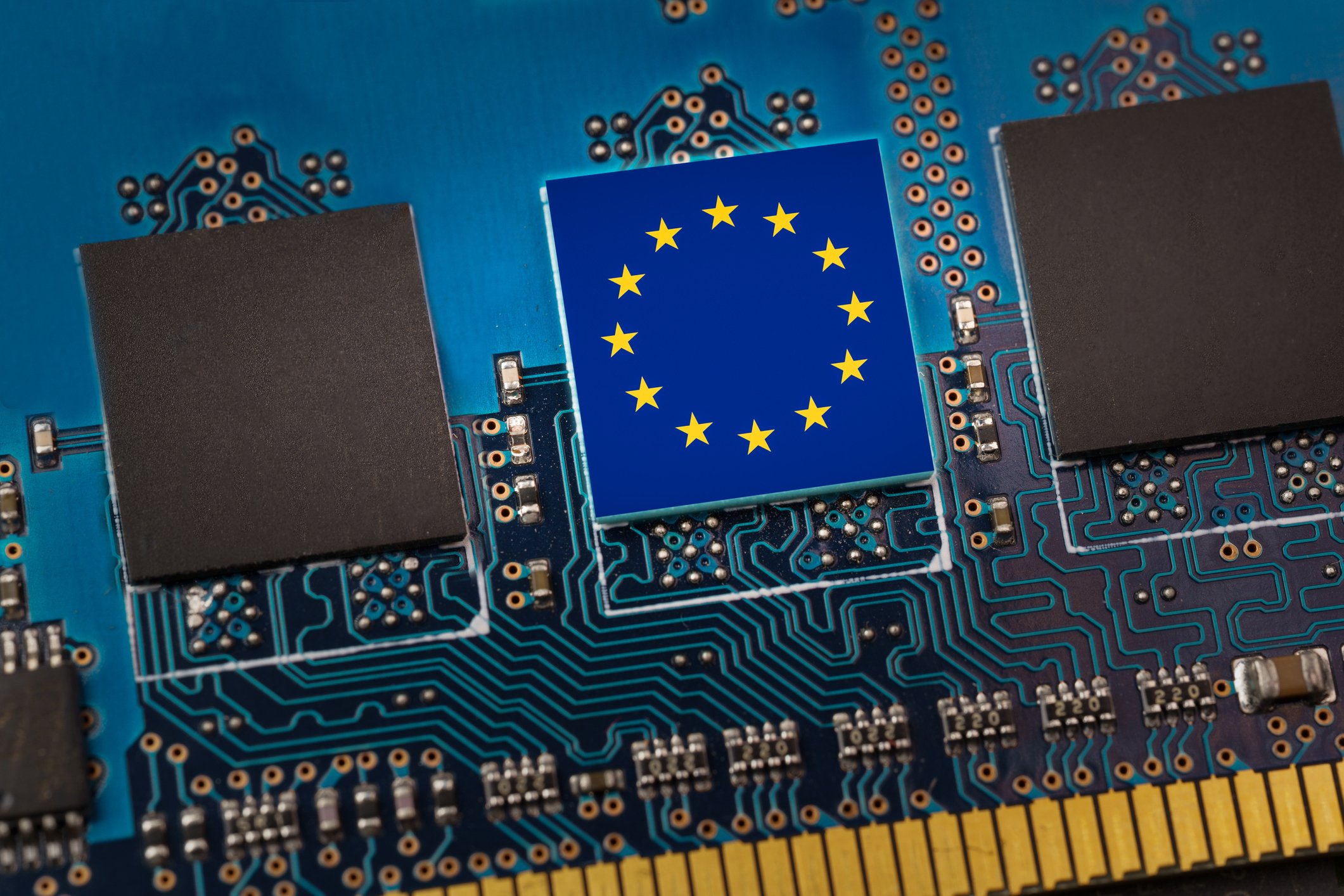 EU flag superimposed on a circuit board