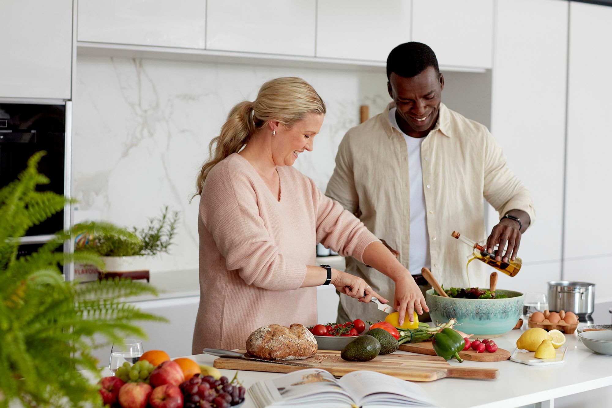 Couple cooking in kitchen