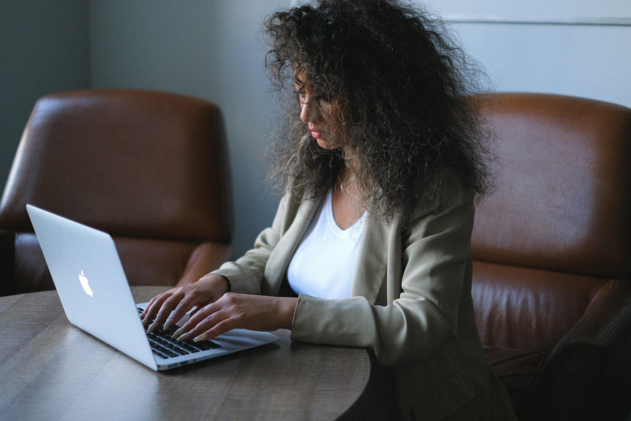Woman looking at laptop