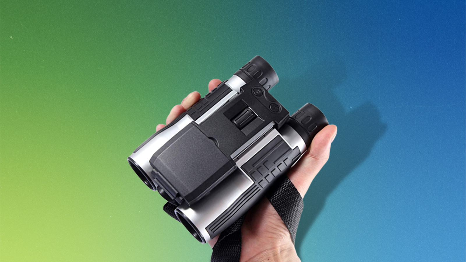 hand holding camera binoculars with blue and green gradient background