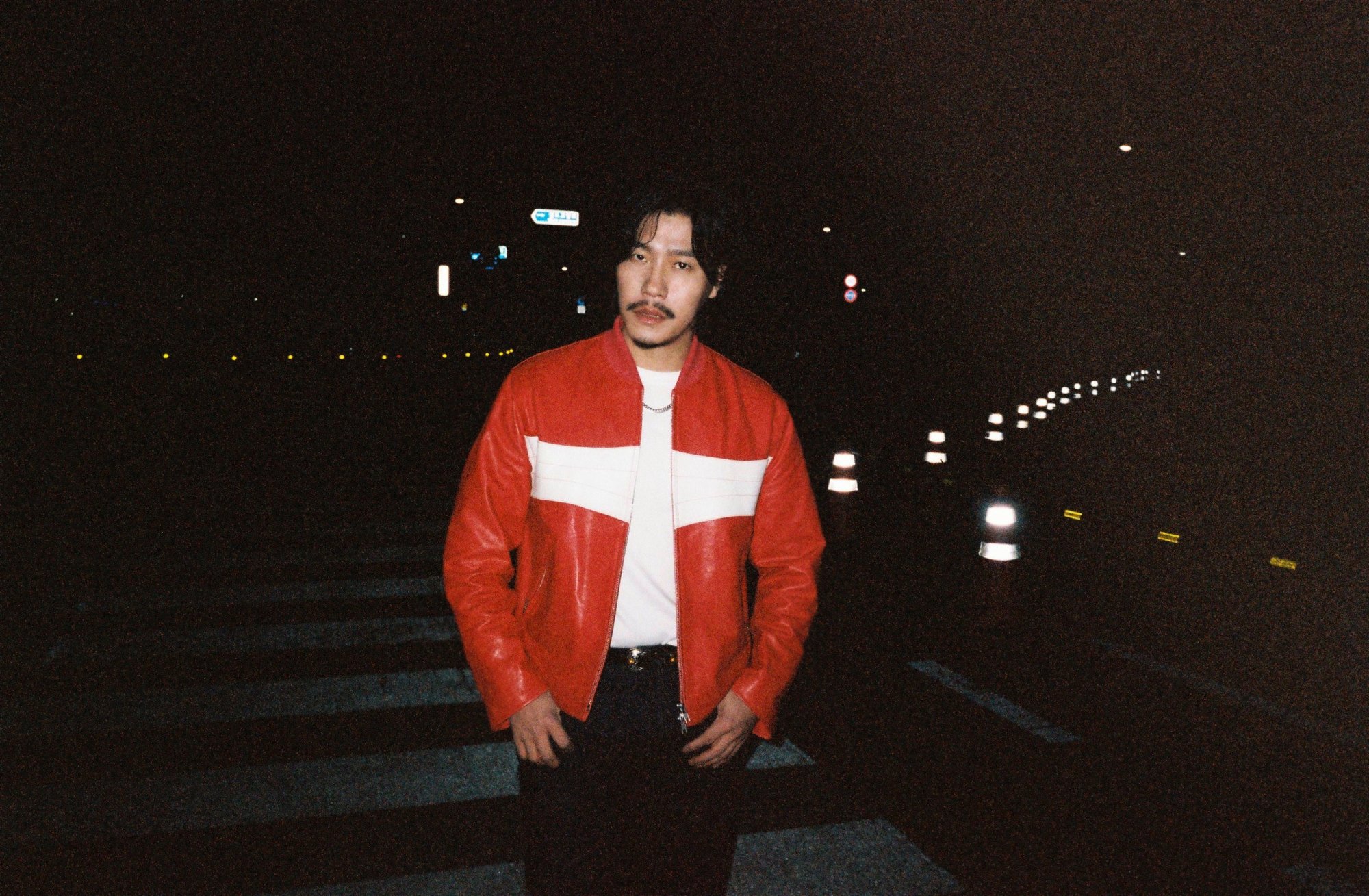 Lee Hyun in a red moto jacket