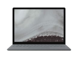The Microsoft Surface Laptop 2 in grey with its screen open to a greyish screensaver