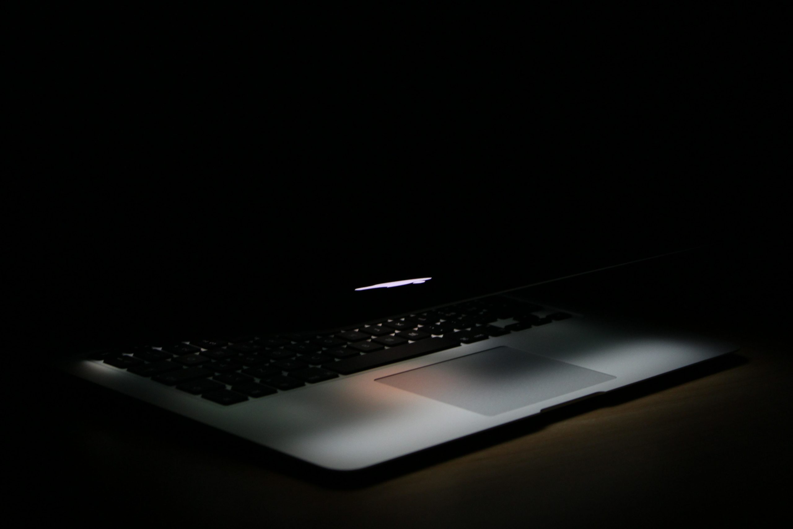 Laptop in dark room