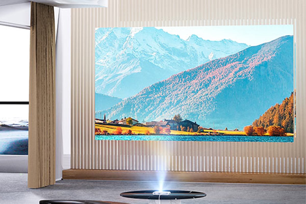 projector showing landscape on a wall