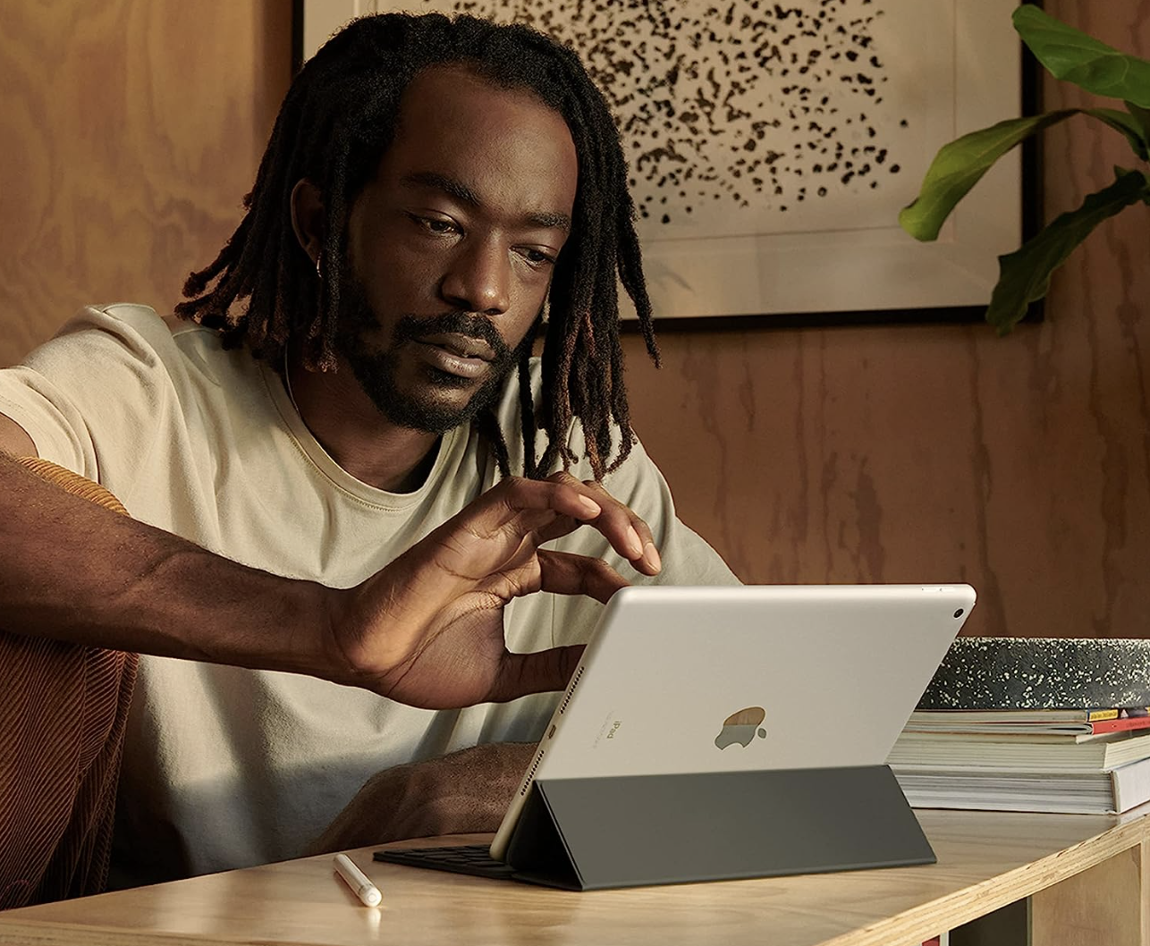 Man using Apple iPad
