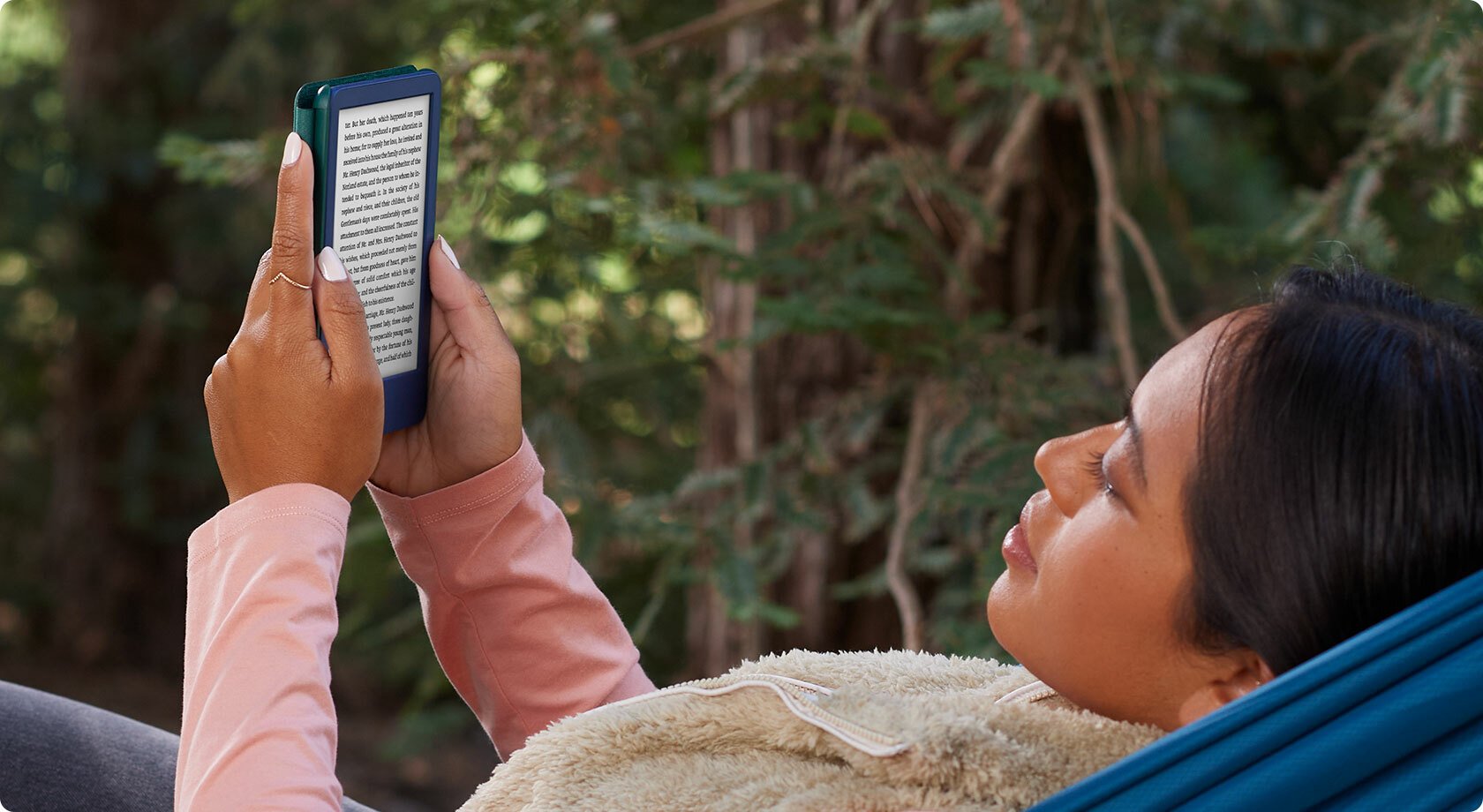 Girl holding Kindle