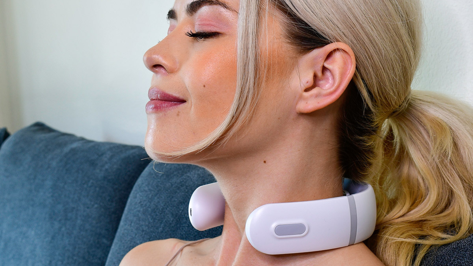 woman using RelaxUltima neck massager