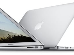 two macbook air laptops back to back