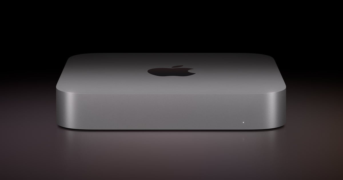 Apple Mac mini positioned over a dark background