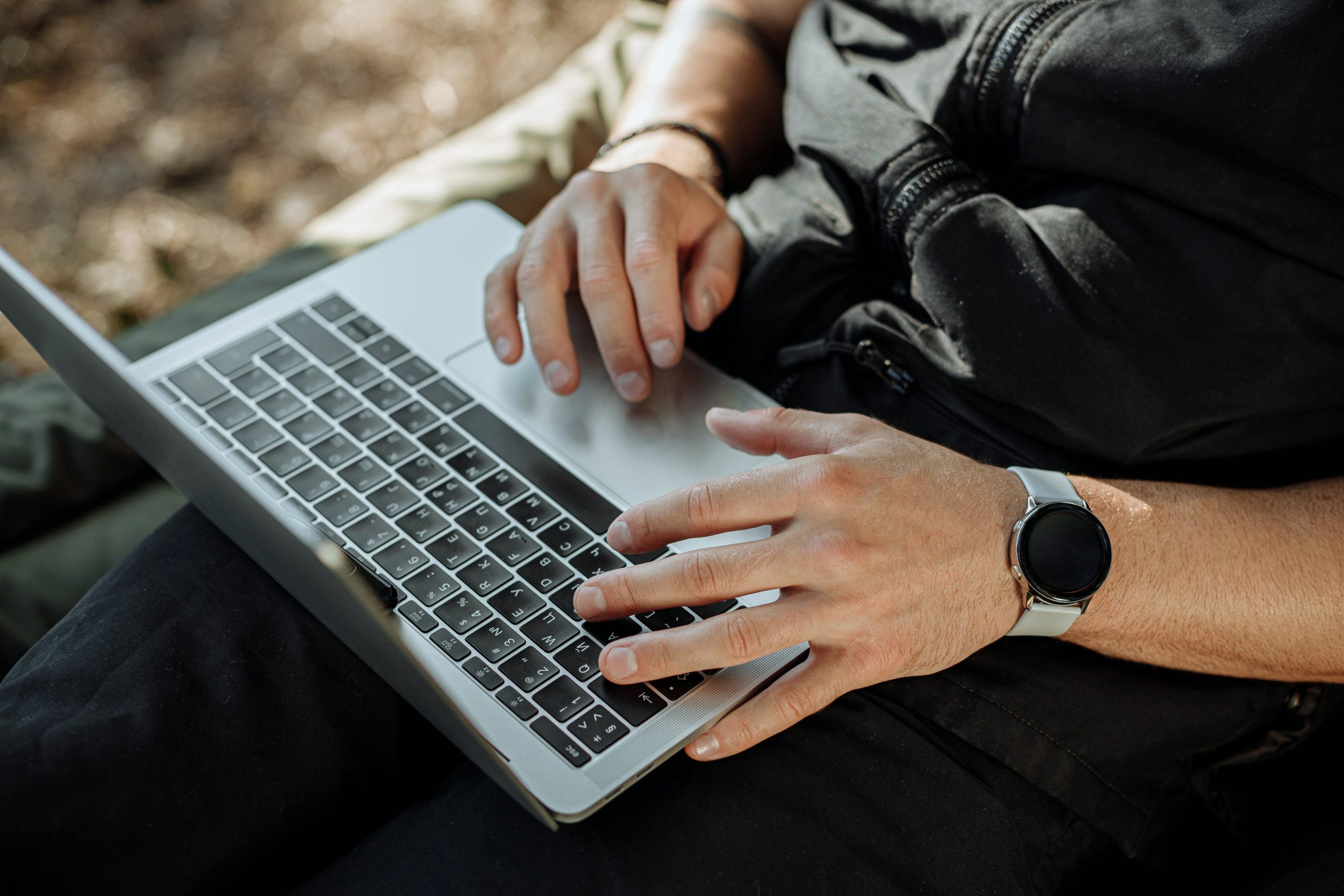 Fingers on laptop