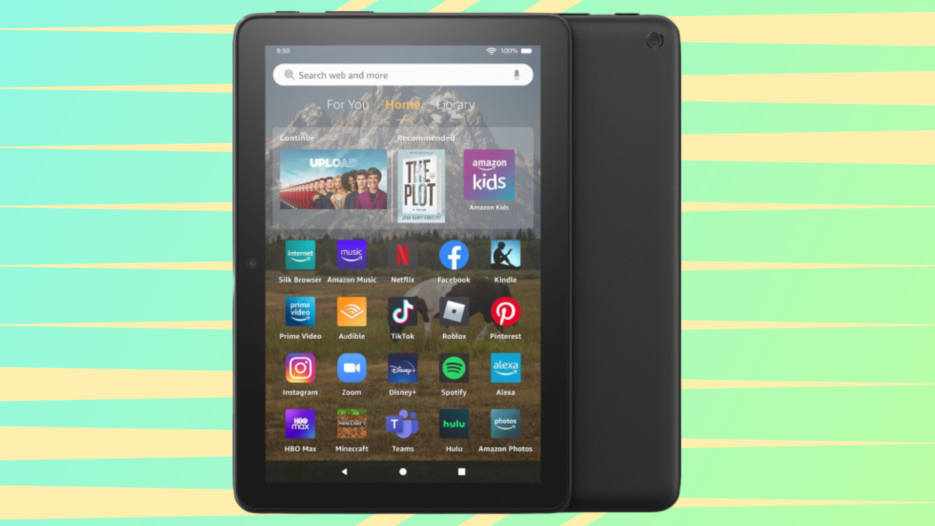 amazon fire hd tablet against a pastel green and yellow background