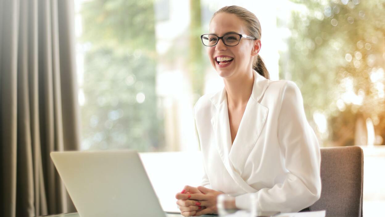 Girl smiling with laptop