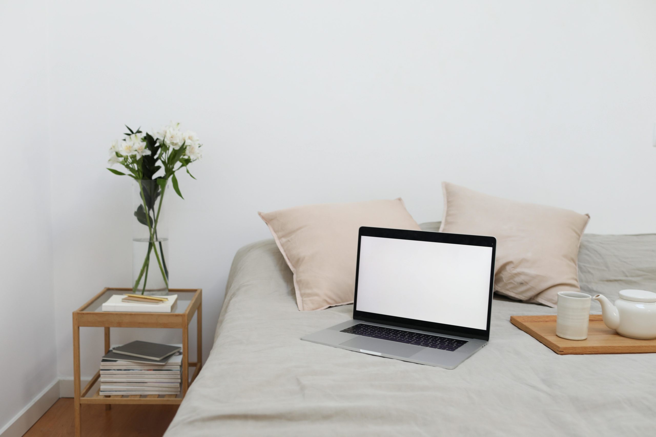 Laptop on bed