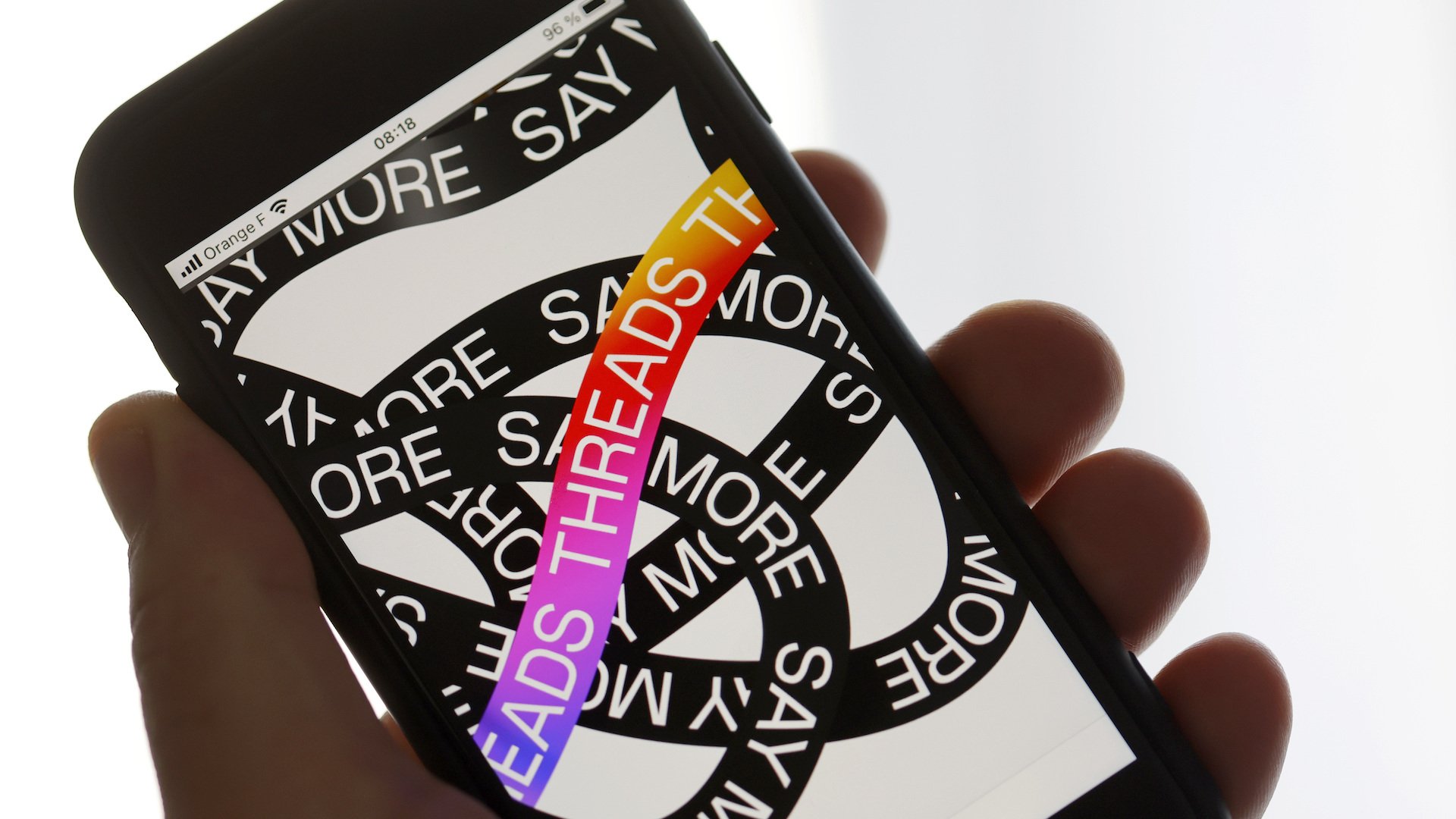 Threads app logo on a smartphone
