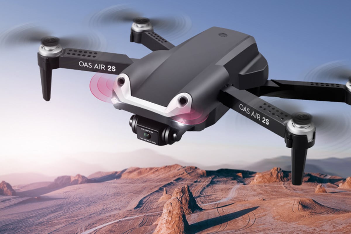 drone flying over desert