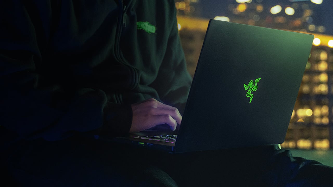 Person using a Razer Blade 15 gaming laptop