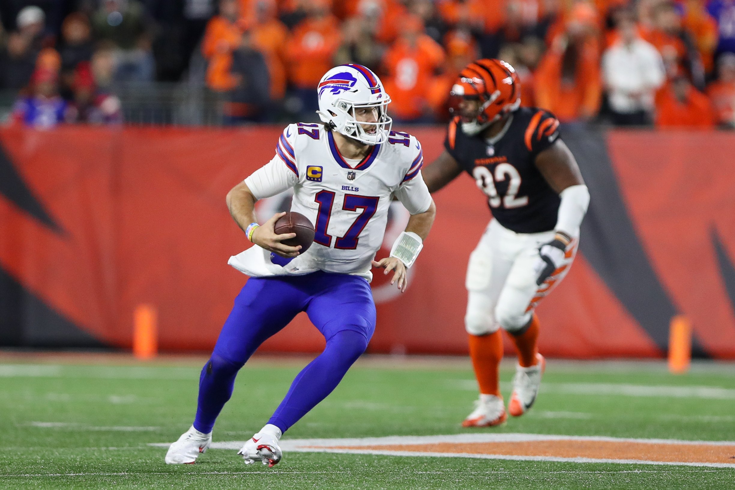 Buffalo Bills quarterback Josh Allen carries the ball