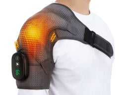 A shoulder massager with orange light to show the heating function.