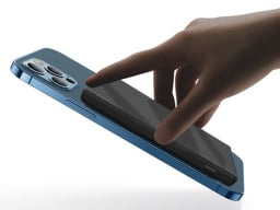 black charger attached to iPhone