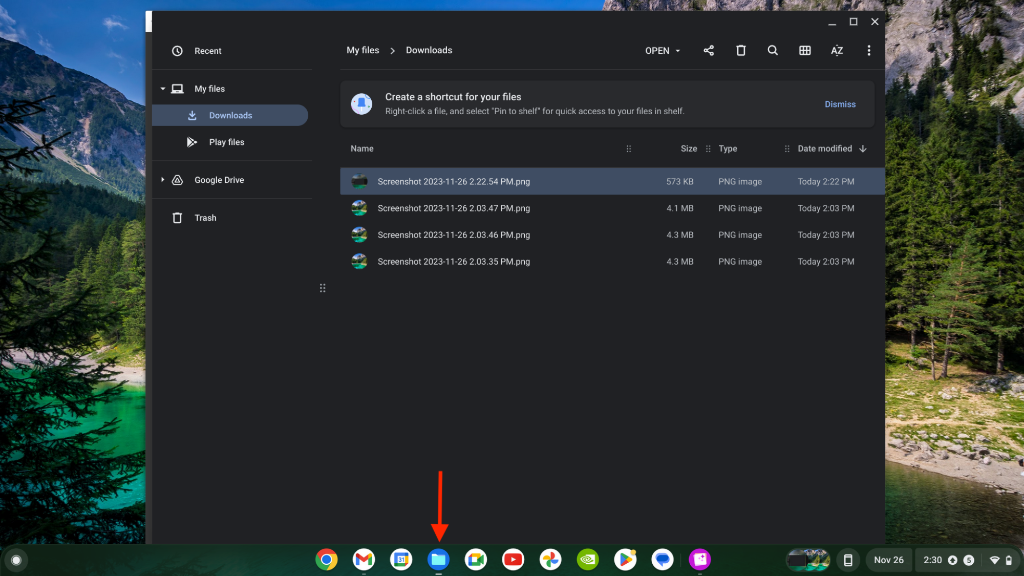 A red arrow pointing to the "Files" icon on a Chromebook