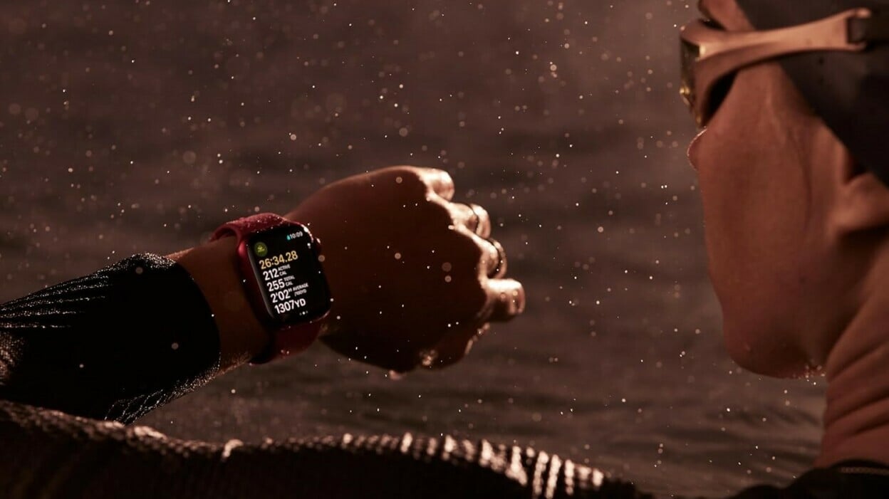 woman wearing Apple Watch Series 9  in the rain