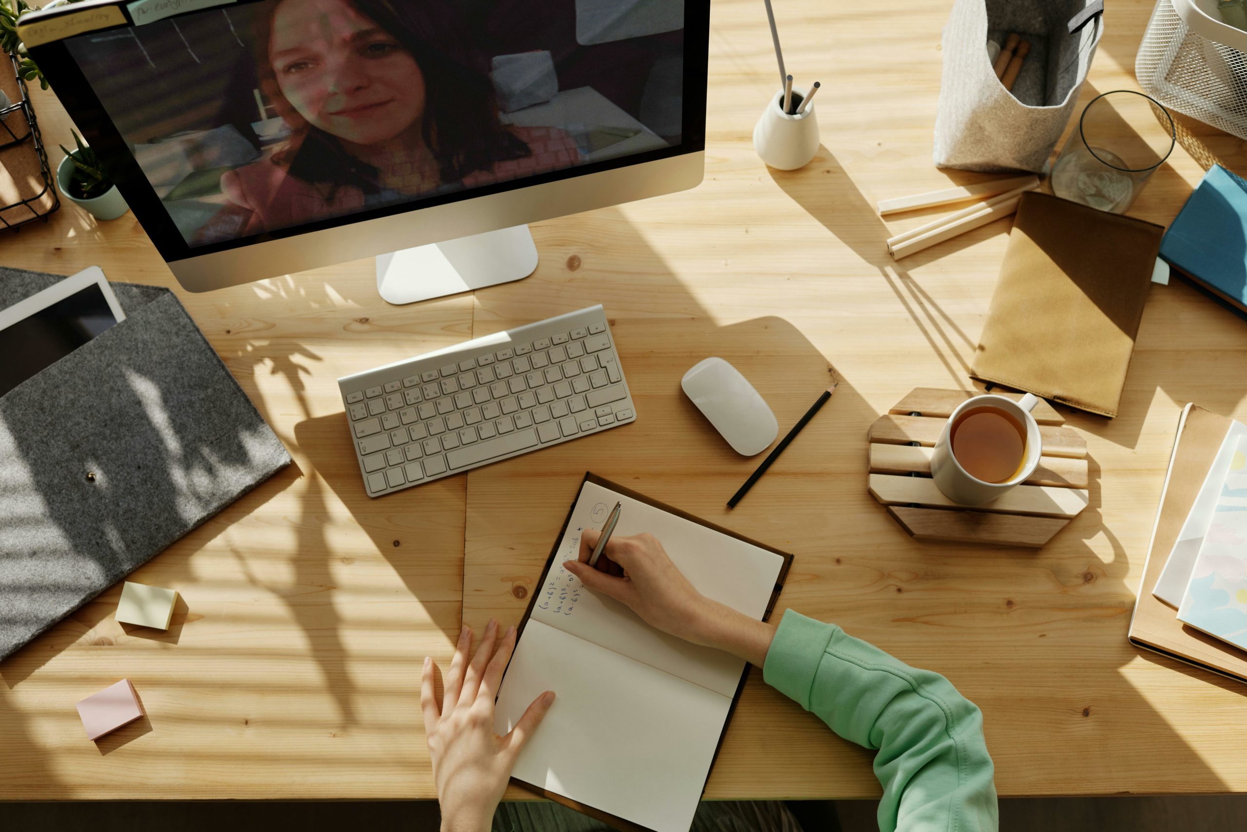 Papers and screen on desk