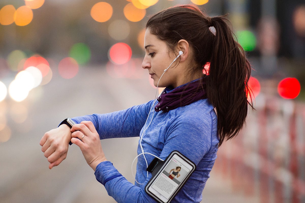 woman running with phone strap