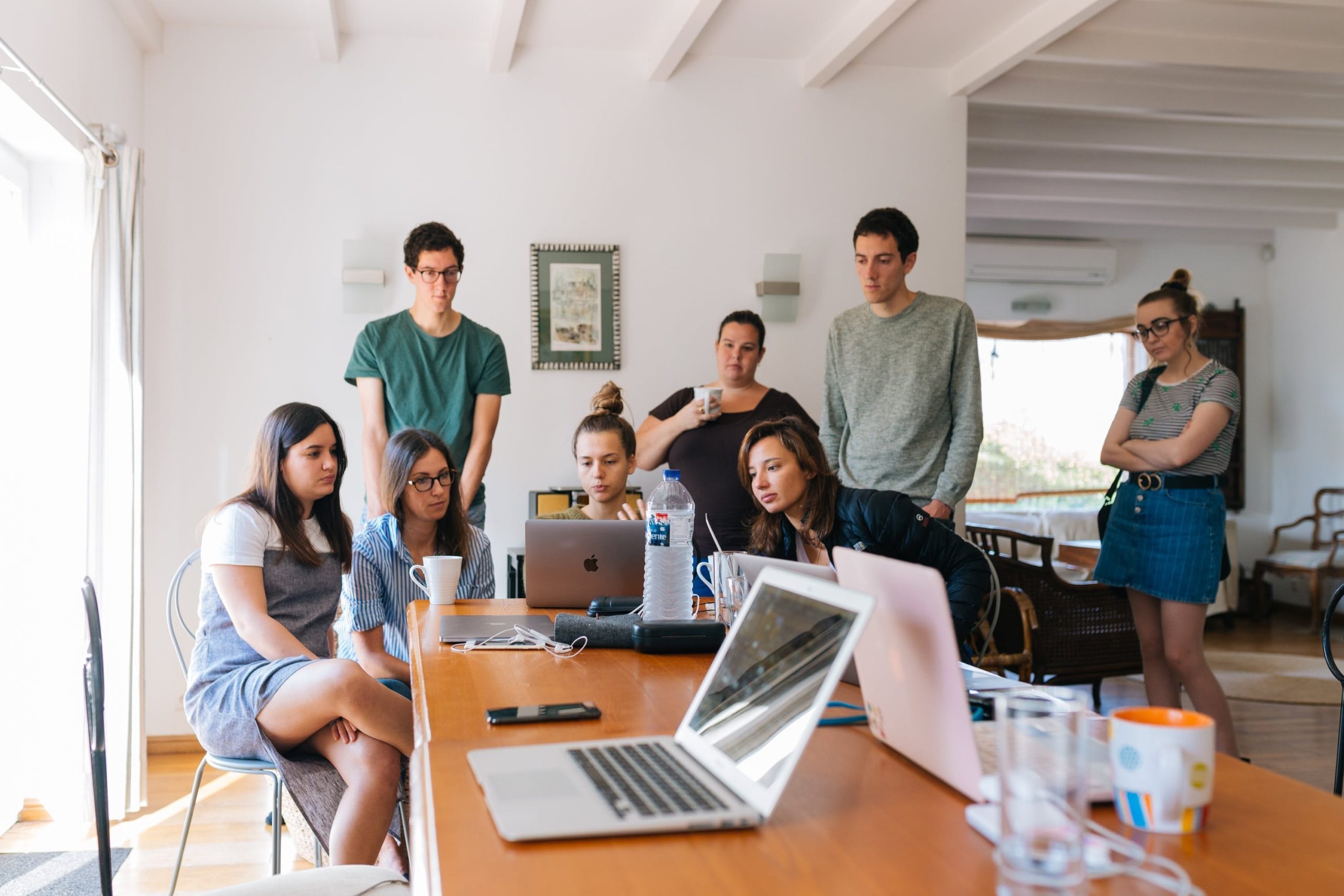 Group looking at laptop