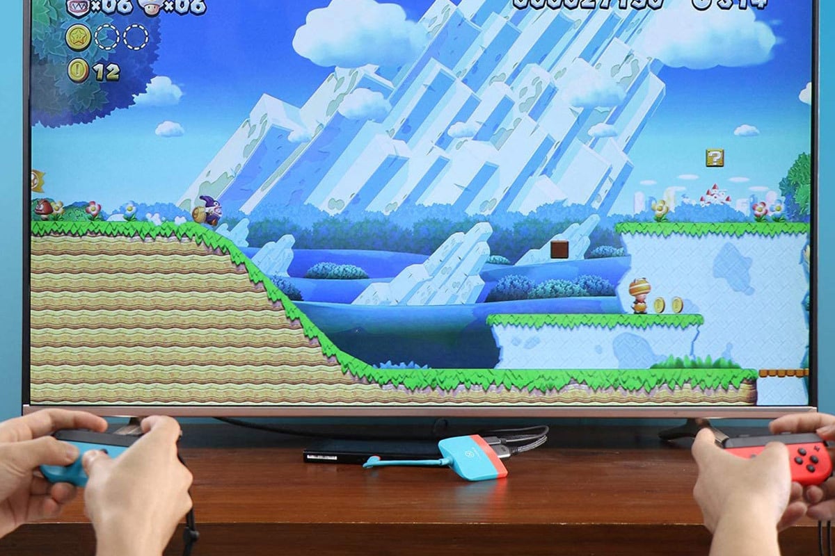 two people playing Super Mario