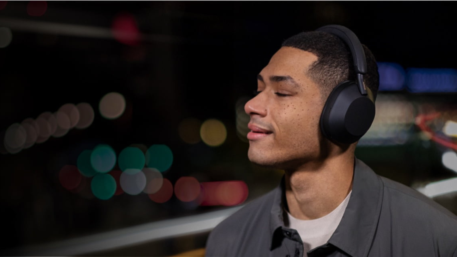 man listening to music with sony wh-1000xm5 headphones