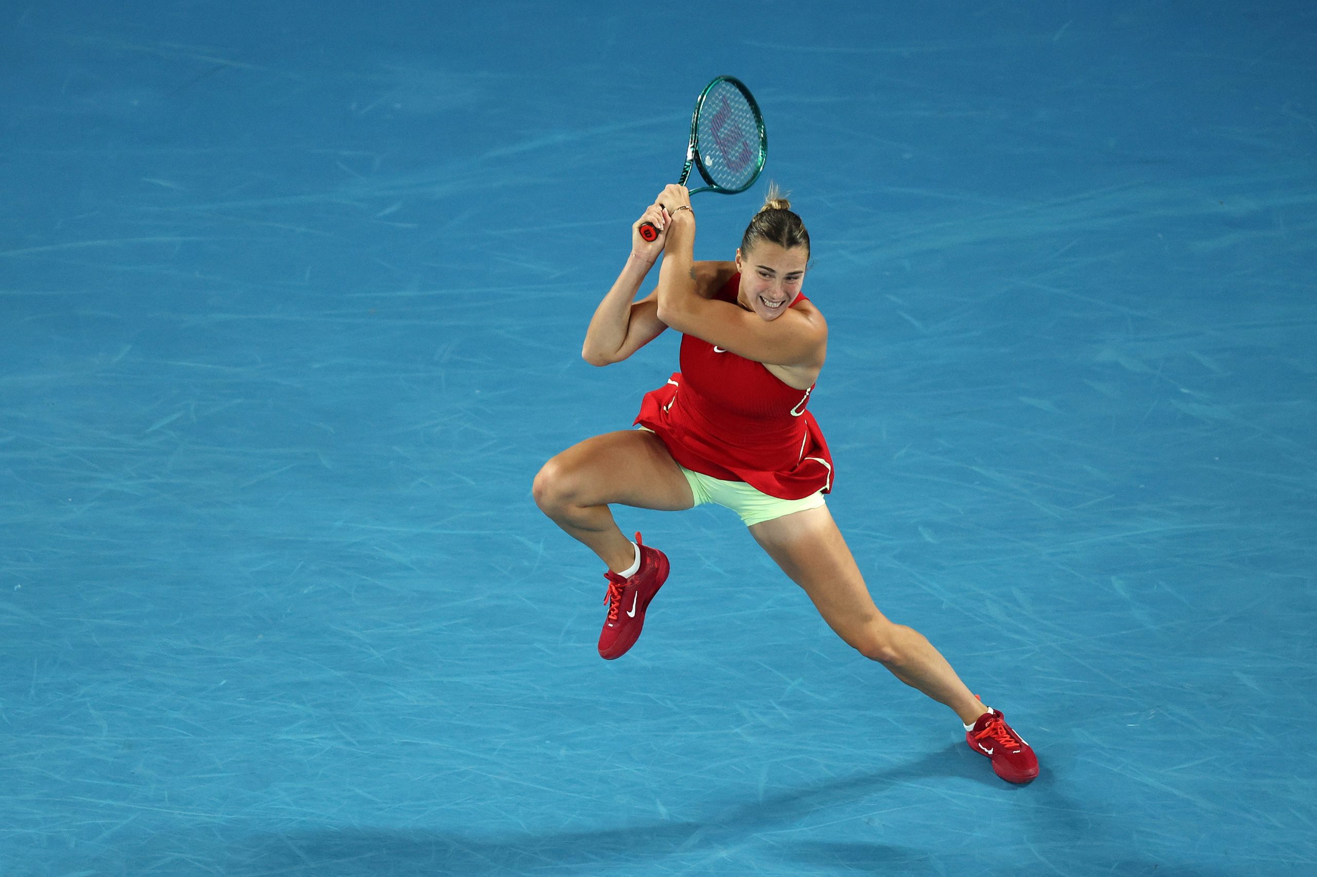 Aryna Sabalenka plays a backhand